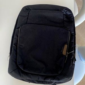 Tucano Backpack model Work Out. Color Black with brown accents